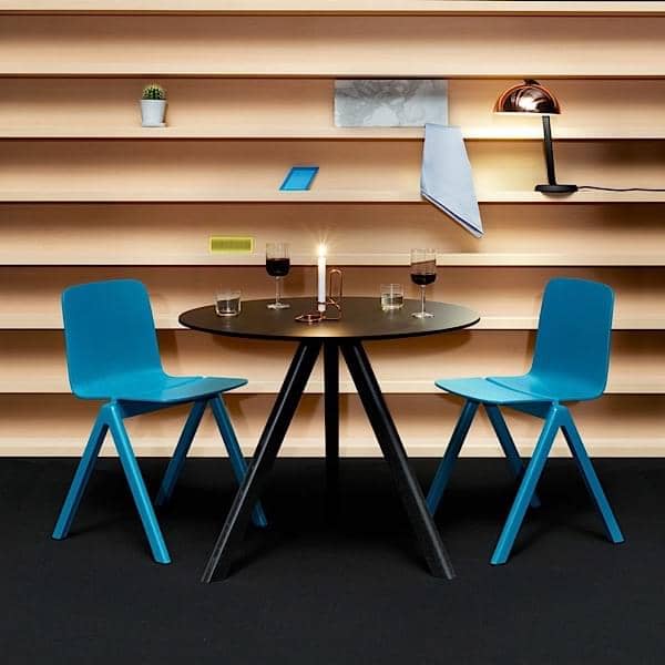 The COPENHAGUE round table CPH20 and CHP25, made in solid wood and
