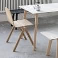 La colección de mesas de comedor COPENHAGUE CPH DEUX en madera maciza y madera contrachapada, por Ronan y Erwan Bouroullec