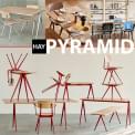 Collection PYRAMID par HAY. Tables, bancs et tables basses réalisées en bois massif et acier.